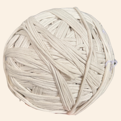 a ball of white yarn on a white background