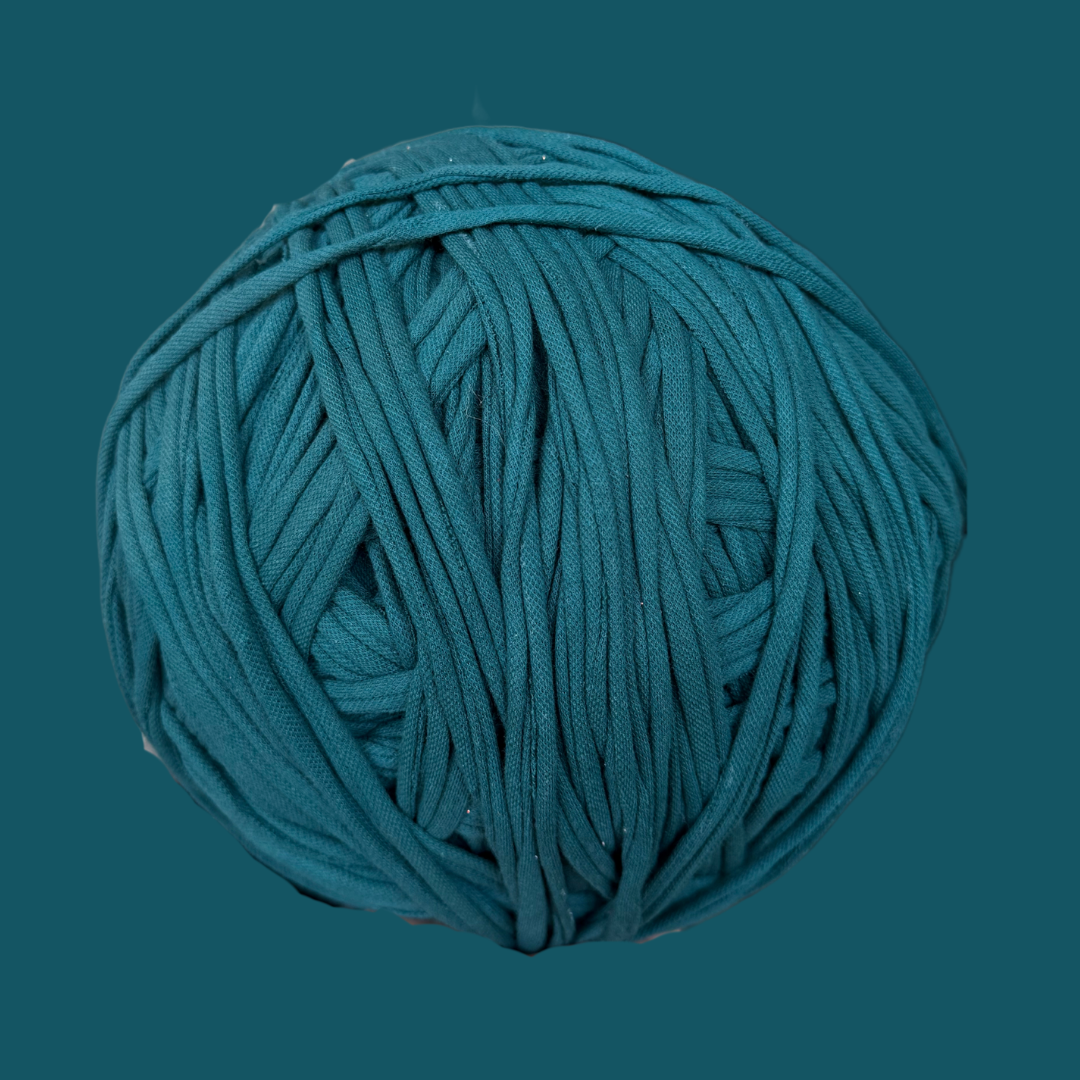 a ball of yarn on a blue background
