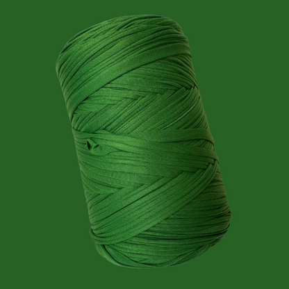a green ball of yarn on a green background